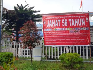 Baliho Penolakan Buruh Atas Permenaker JHT, Terpampang Besar di Kantor Disnaker Sumut